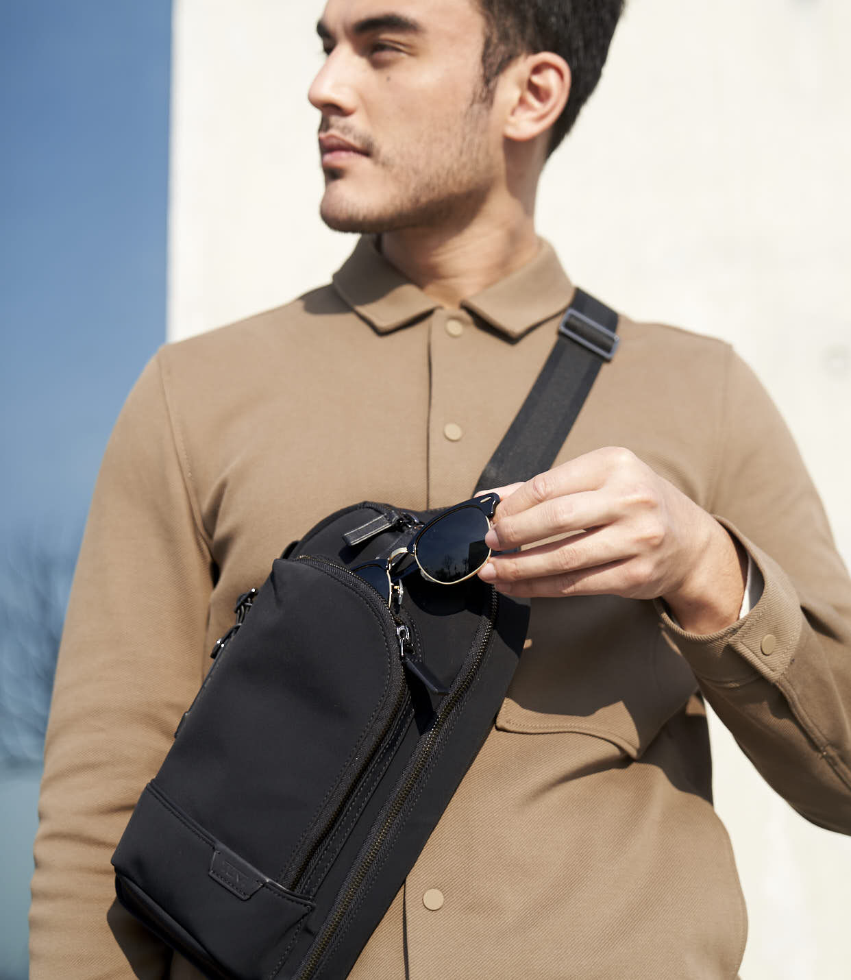 tumi single strap backpack