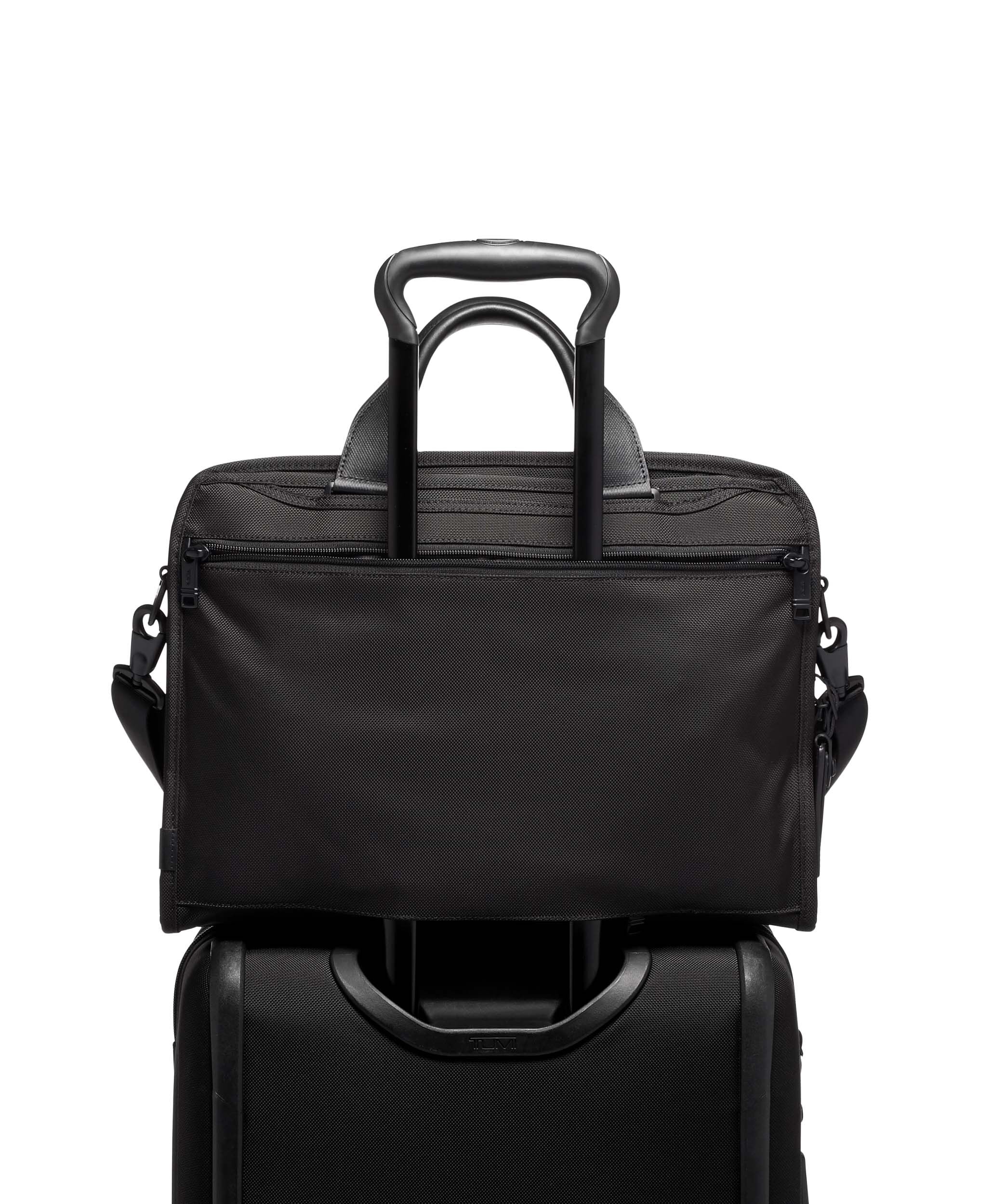 tumi deluxe 4 wheeled laptop case brief