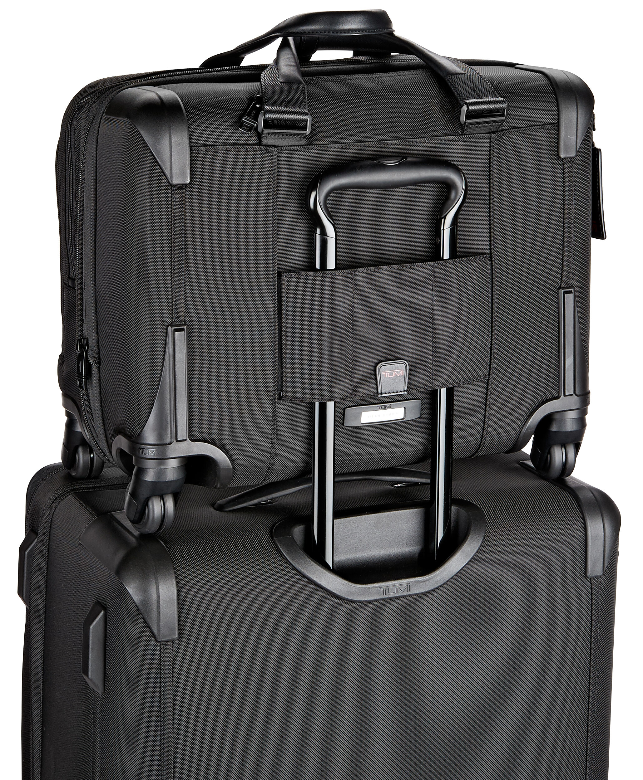 tumi deluxe 4 wheeled laptop case brief